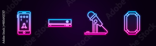 Set line Mobile and playing in game, Video console, Microphone and Poker table. Glowing neon icon. Vector
