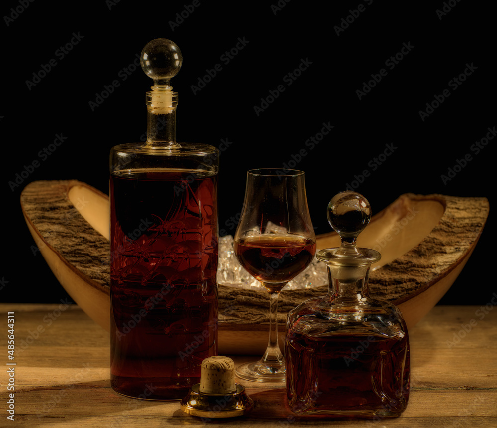 Very old whiskey is bottled in two glasses. With a beautiful gradient.