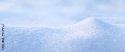 Banner with natural podium from snow snowdrift for mockup display or presentation of products. Advertising theme concept. Blank winter and christmas background.