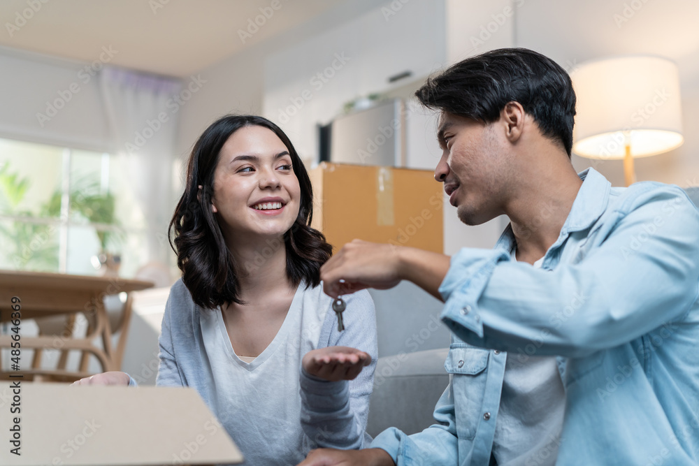 Asian young happy new marriage couple moving to new house together. Asian young happy new marriage couple moving to new house together.