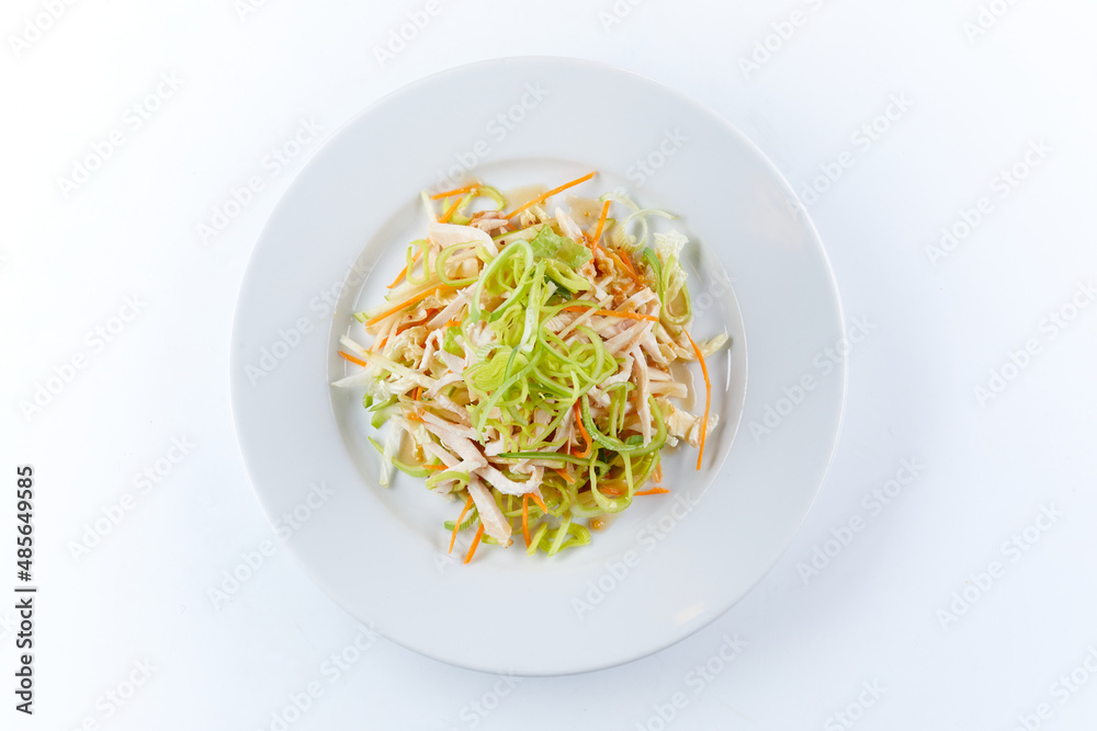 cabbage salad on the white plate cabbage salad on the white plate
