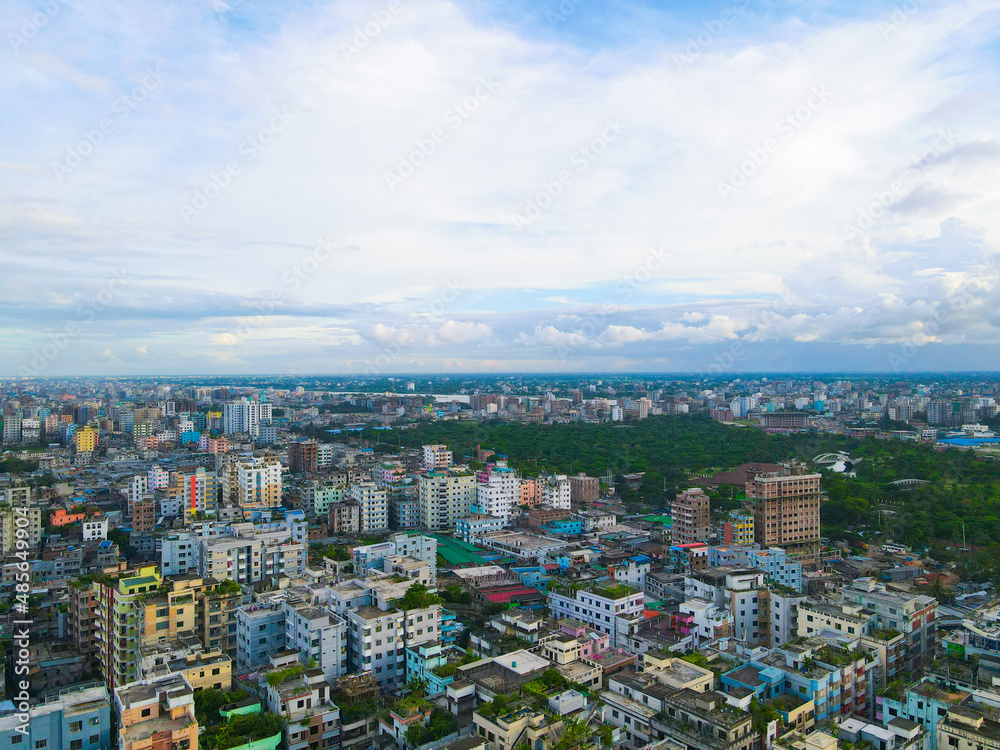 Fototapeta premium Dhaka Bangladesh skyline aerial drone view from above, Bird's eye view from helicopter of cityscape metropolis infrastructure, traffic cars, yellow cabs moving on city streets