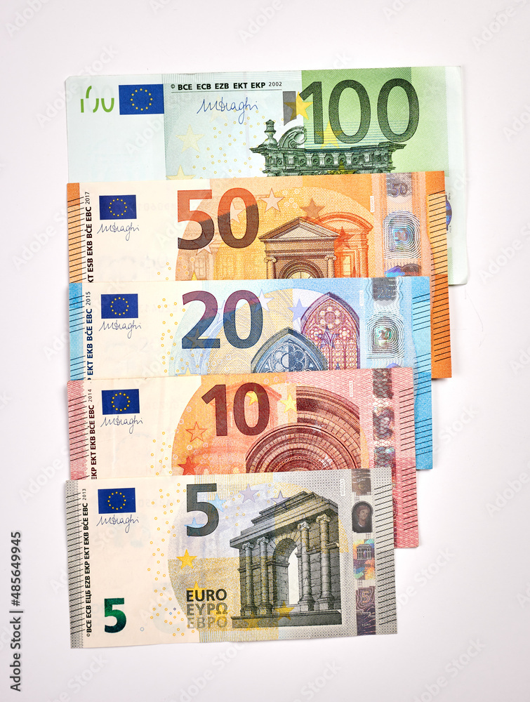 Euro paper banknotes nominals set. Set of European money bills. EUR currency in shingles order. Different values of Euro banknotes. 5, 10, 20, 50, 100 bank bills of Europe. Cash on a white surface. Euro paper banknotes nominals set. Set of European money bills. EUR currency in shingles order. Different values of Euro banknotes. 5, 10, 20, 50, 100 bank bills of Europe. Cash on a white surface.