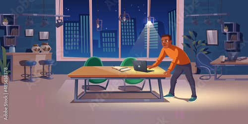 Man work late until night in office. Concept of overtime job, deadline or workaholic person. Vector cartoon illustration of workplace interior with laptop and notebook on desk and employee