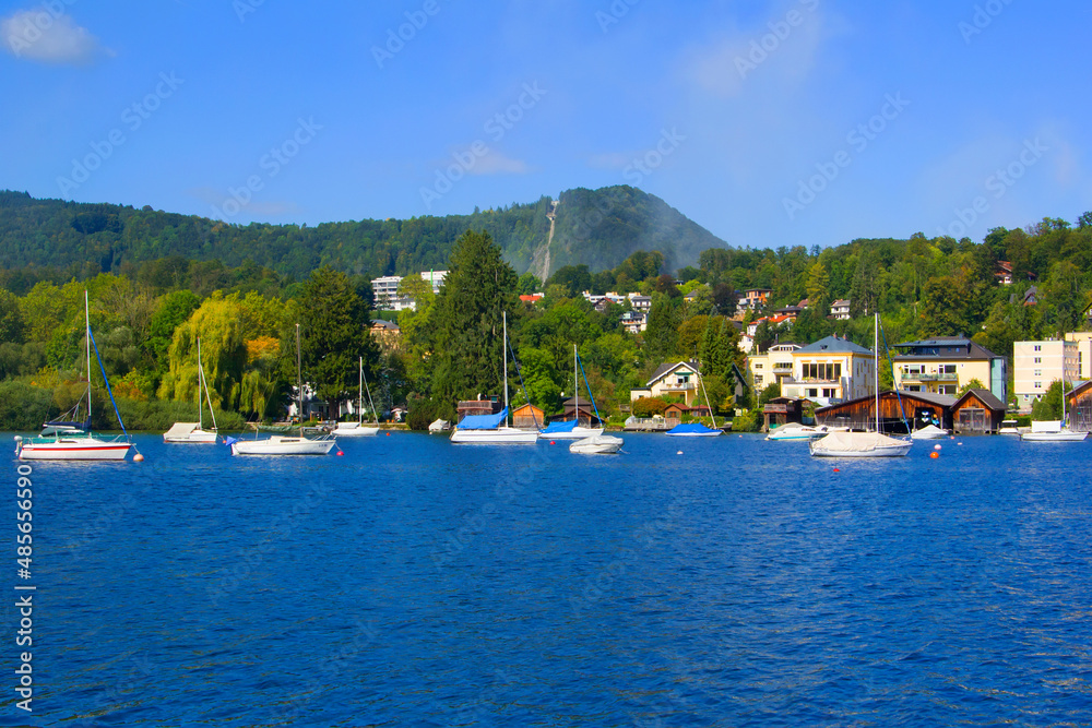 photo background view of the residential area and the marina, on the shore of Lake Traunsee, in the vicinity of Gmunden, Austria, Salzkammergut