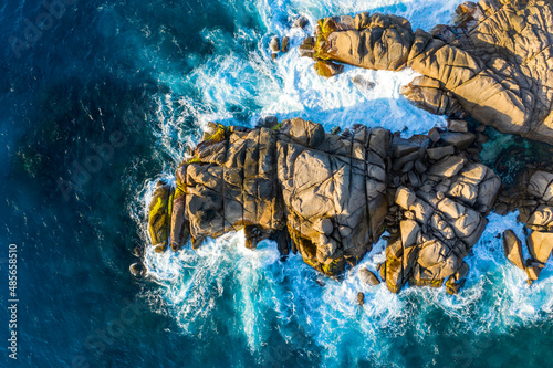 Aerial view of rocky coastline near Police Bay in Takamaka, Seychelles. photo