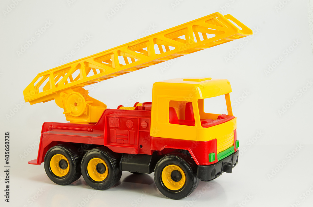 Fire truck. Multi-colored plastic toy cars for children.