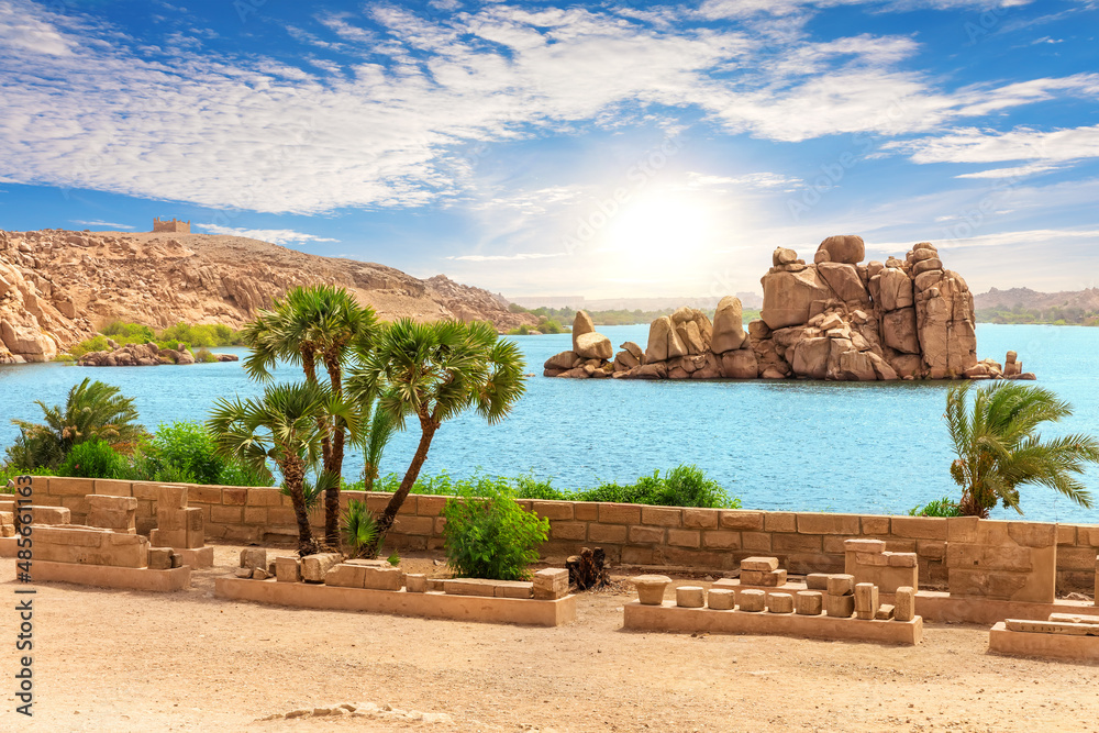 Rocks in lake Nasser of the Nile river near Philae temple, Aswan, Egypt