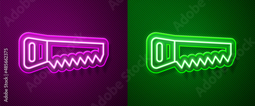 Glowing neon line Hand saw icon isolated on purple and green background. Vector