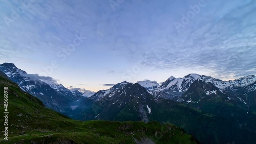 Wallpaper Mural Scenic view of beautiful landscape in Swiss Alps. Fresh green meadows and snow-capped mountain tops in the background in springtime, Switzerland. Torontodigital.ca