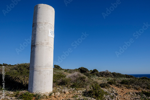 Signage milestone of Migjorn de Mallorca Marine Reserve, Cala Figuereta, Santanyi, Mallorca, Balearic Islands, Spain