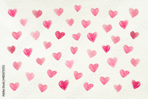 Love background with many watercolor hearts painted on a recycled white paper for Valentine's Day or other celebrations, letter, copy space