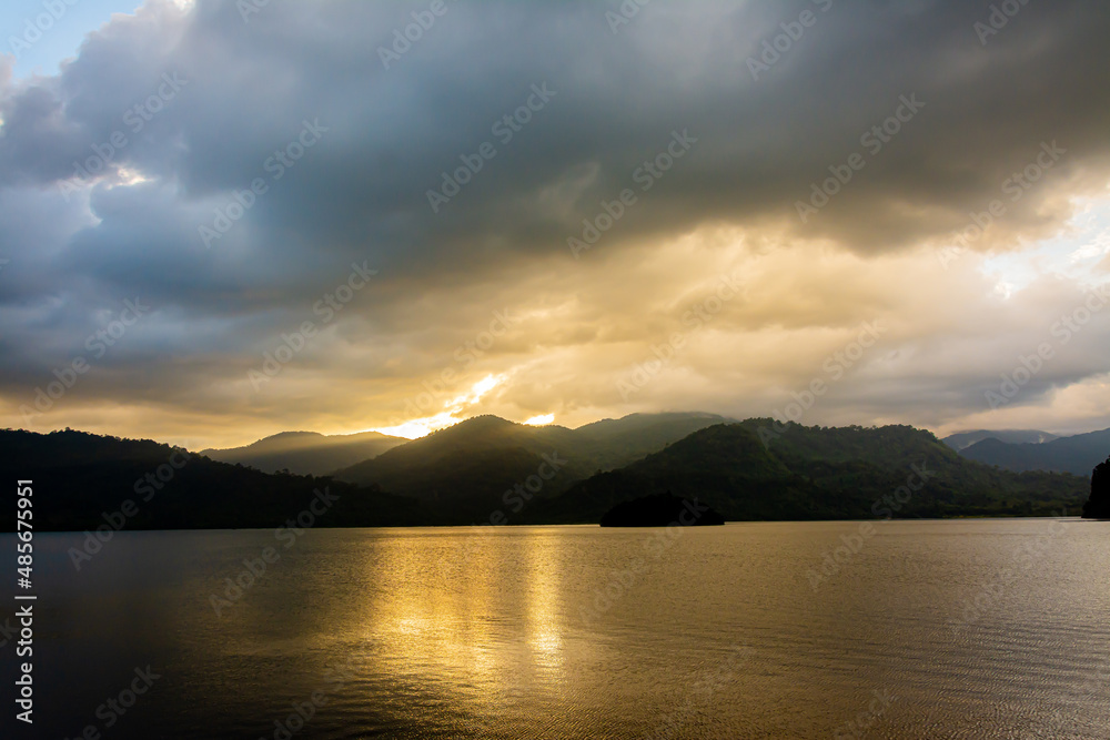 landscape Mountain with colorful vivid sunset on the cloudy sky