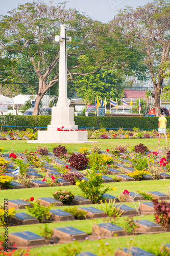War Memorial Cross and Lines of Graves at Kanchanaburi War Cemetery, Thailand, Southeast Asia