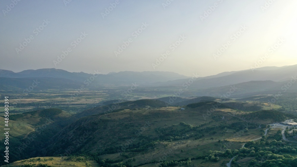 Naklejka premium survol d'un lac de montagne matemale et des forets dans les Pyrénées-Orientales, sud de la France, parc naturel des Bouillouses