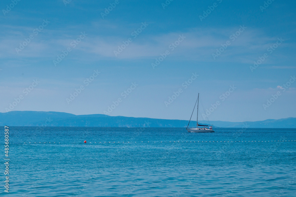 Yacht in the adriatic sea near Kostrena, Croatia Yacht in the adriatic sea near Kostrena, Croatia