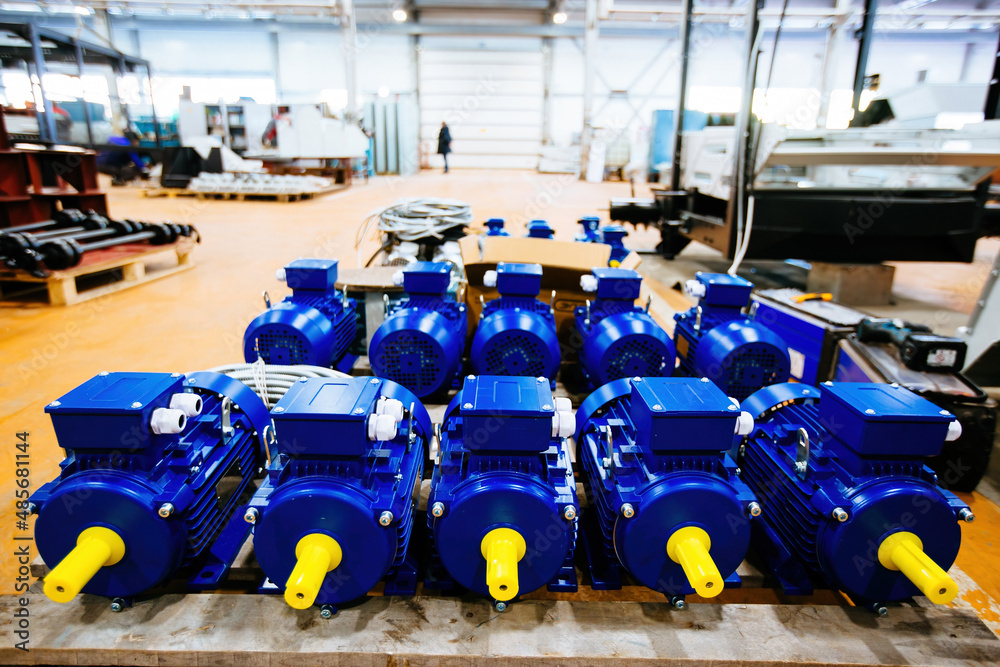 New blue electric motors in the factory for assembling New blue electric motors in the factory for assembling