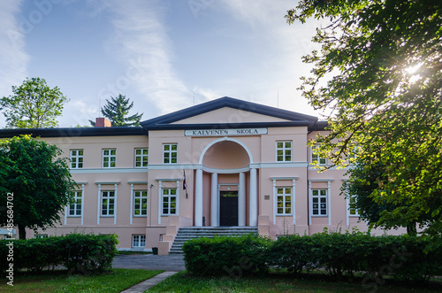 Tasu - Padures manor in sunny summer evening, Kalvene, Latvia. Translated: Kalvene school