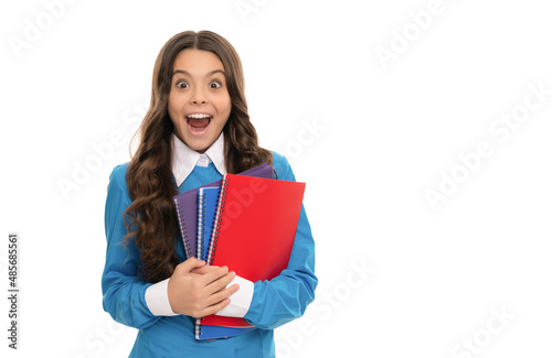 amazed child long curly hair hold school workbook isolated on white, school
