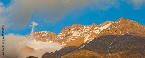 Panoramic photo of snow capped mountains between Tacheddirt and Tizi n Tamatert, High Atlas Mountains, Morocco, North Africa, Africa