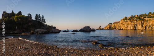 Fototapeta Naklejka Na Ścianę i Meble -  Taormina, panoramic photo of Isola Bella Beach in the first morning light, Sicily, Italy, Europe