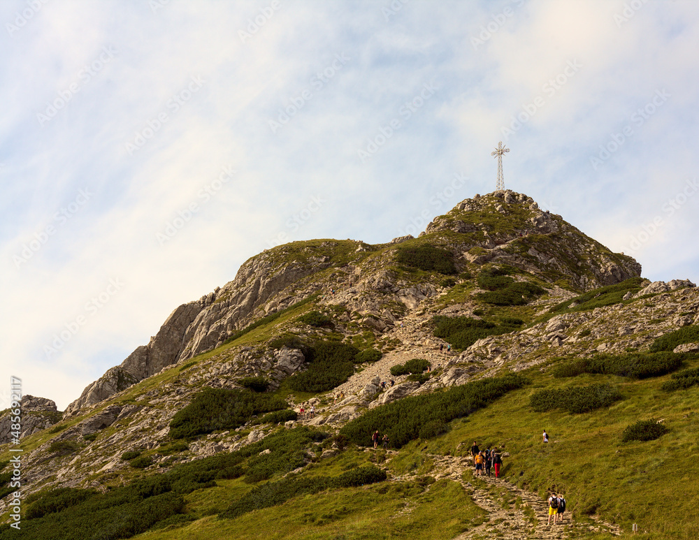 Fototapeta premium cross on top of the mountain