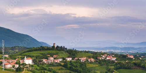 Vineyards and  the hill top town of Kojsko, Goriska Brda (Gorizia Hills), in Brda, the wine region of Slovenia, Europe © Matthew