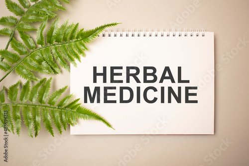 white card sign with herbal medicine check text message isolated on hospital clinic office background.