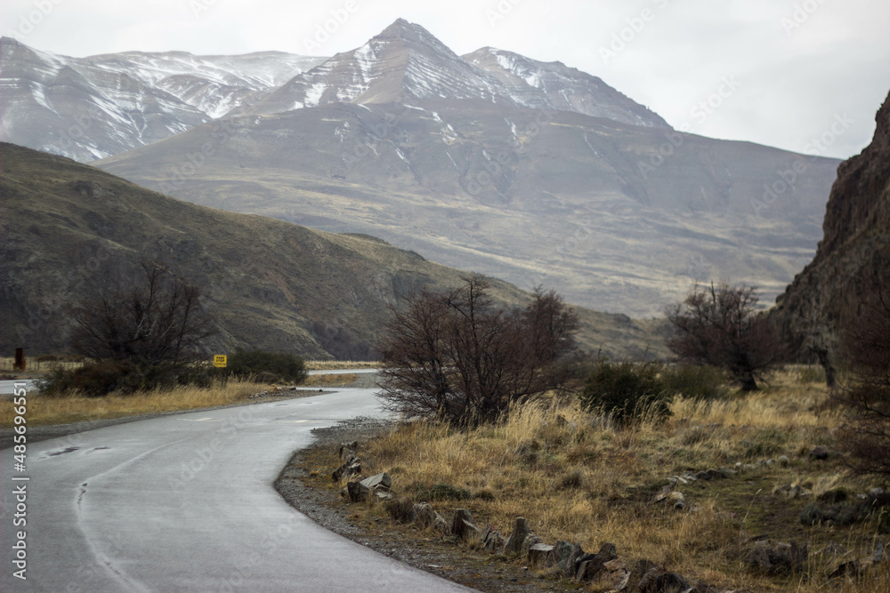 Road landscape between mountains in winter