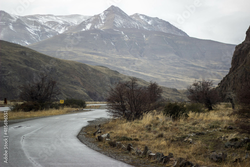 Road landscape between mountains in winter
