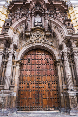 Large wooden church doors in historic centre of Lima, Lima Province, Peru, South America