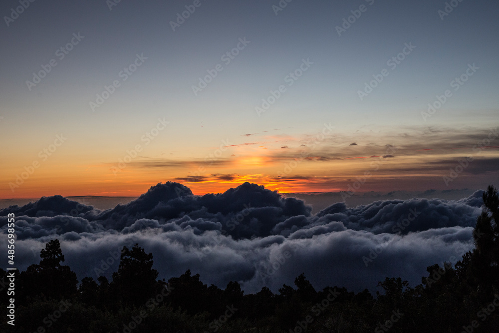 sunset over the clouds sunset over the clouds