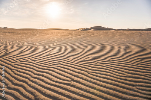 Sand dunes at sunset in the desert at Huacachina, Ica Region, Peru, South America