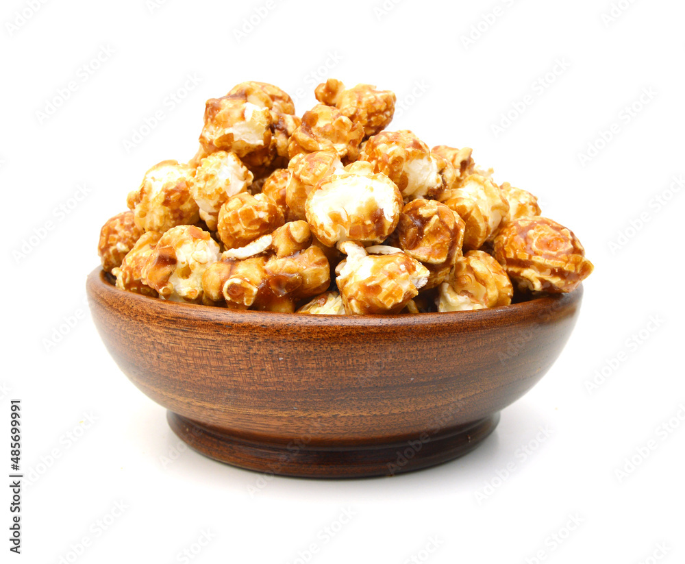 Caramel popcorn on a white background Caramel popcorn on a white background