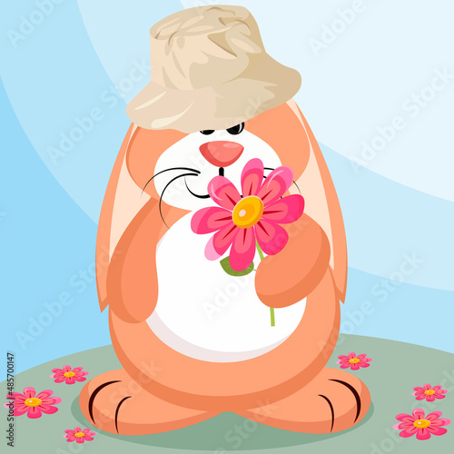 hare in a hat on a meadow with flowers
