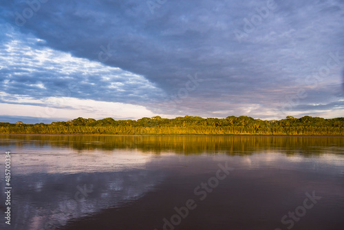 Sunrise over river in Amazon Jungle of Peru, Tambopata National Reserve, Peru, South America