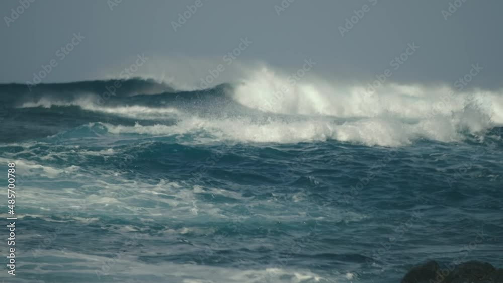 Incredibly beautiful huge waves on the coast of the Spanish island of Tenerife in the Atlantic Ocean. Slow Motion Incredibly beautiful huge waves on the coast of the Spanish island of Tenerife in the Atlantic Ocean. Slow Motion