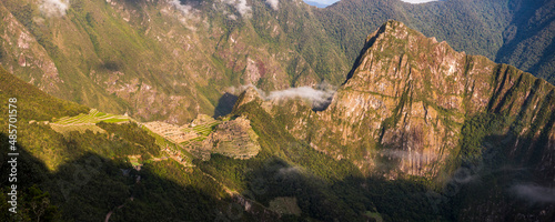 Machu Picchu Inca ruins at sunrise seen from Sun Gate (Inti Punku or Intipuncu), Cusco Region, Peru, South America photo