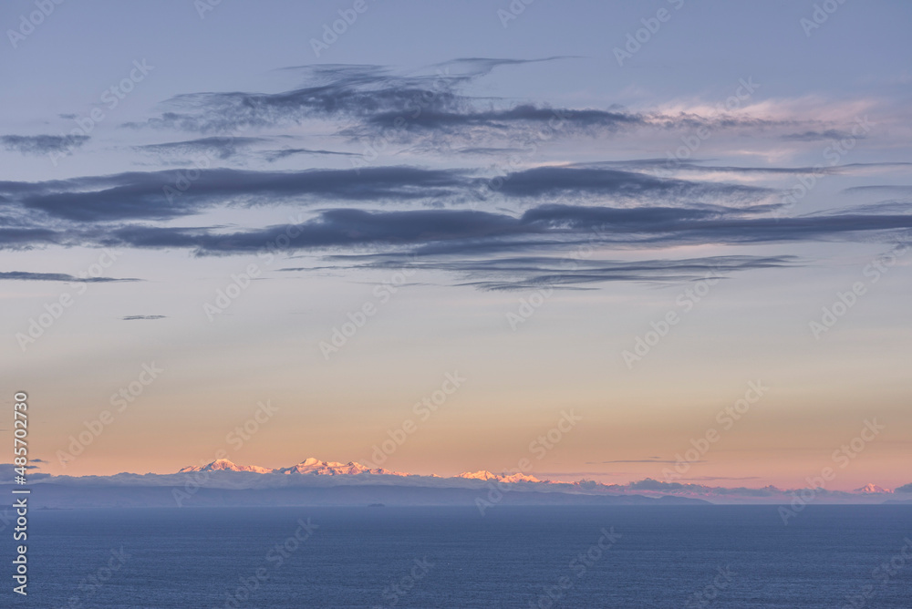 Cordillera Real Mountain Range sunset (Bolivia) seen from Amantani Island on Lake Titicaca (Peru), South America