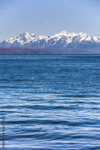 Cordillera Real Mountain Range (part of Andes Mountain Range) behind Lake Titicaca, seen from Isla del Sol, Bolivia, South America
