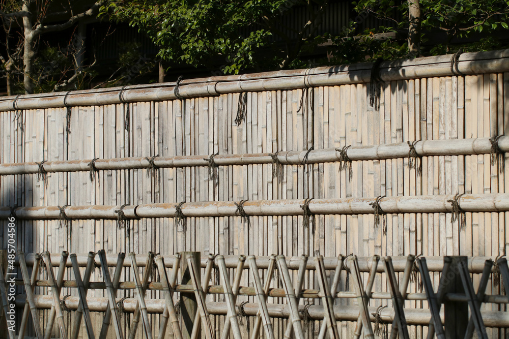 Japanese house traditional way style exterior, roped bamboo fence ...
