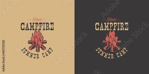 Camp bonfire with a large flame and sparks for explore and adventure in forest hiking. Burning campfire for camping.