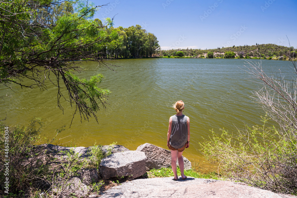 Fototapeta premium Tourist at lake at Valle Fertil, San Juan Province, North Argentina, South America
