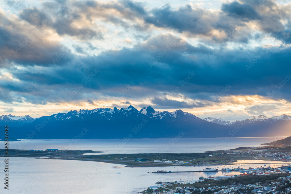 Andes Mountains with dramatic sunset clouds and sky at Ushuaia, the southern most city in the world, Tierra del Fuego, Patagonia, Argentina, South America