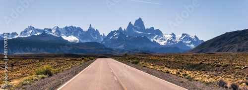 Long straight road to El Chalten, with Mount Fitz Roy (aka Cerro Chalten) behind, El Chalten, Patagonia, Argentina, South America, background with copy space