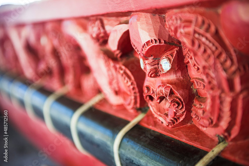 Wooden carving details on a Maori War Canoe, Waitangi Treaty Grounds, Bay of Islands, North Island, New Zealand