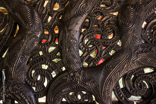 Wooden carving details on a Maori War Canoe, Waitangi Treaty Grounds, Bay of Islands, North Island, New Zealand photo
