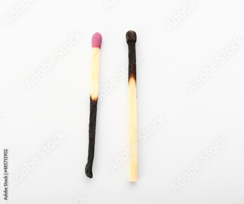 Burnt out matchsticks on white background. Emotional burnout concept