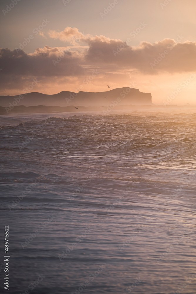 Fototapeta premium Sunrise at Vik Beach, South Region (Sudurland), Iceland, Europe, background with copy space