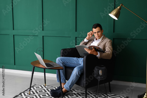 Young man with eyeglasses r...